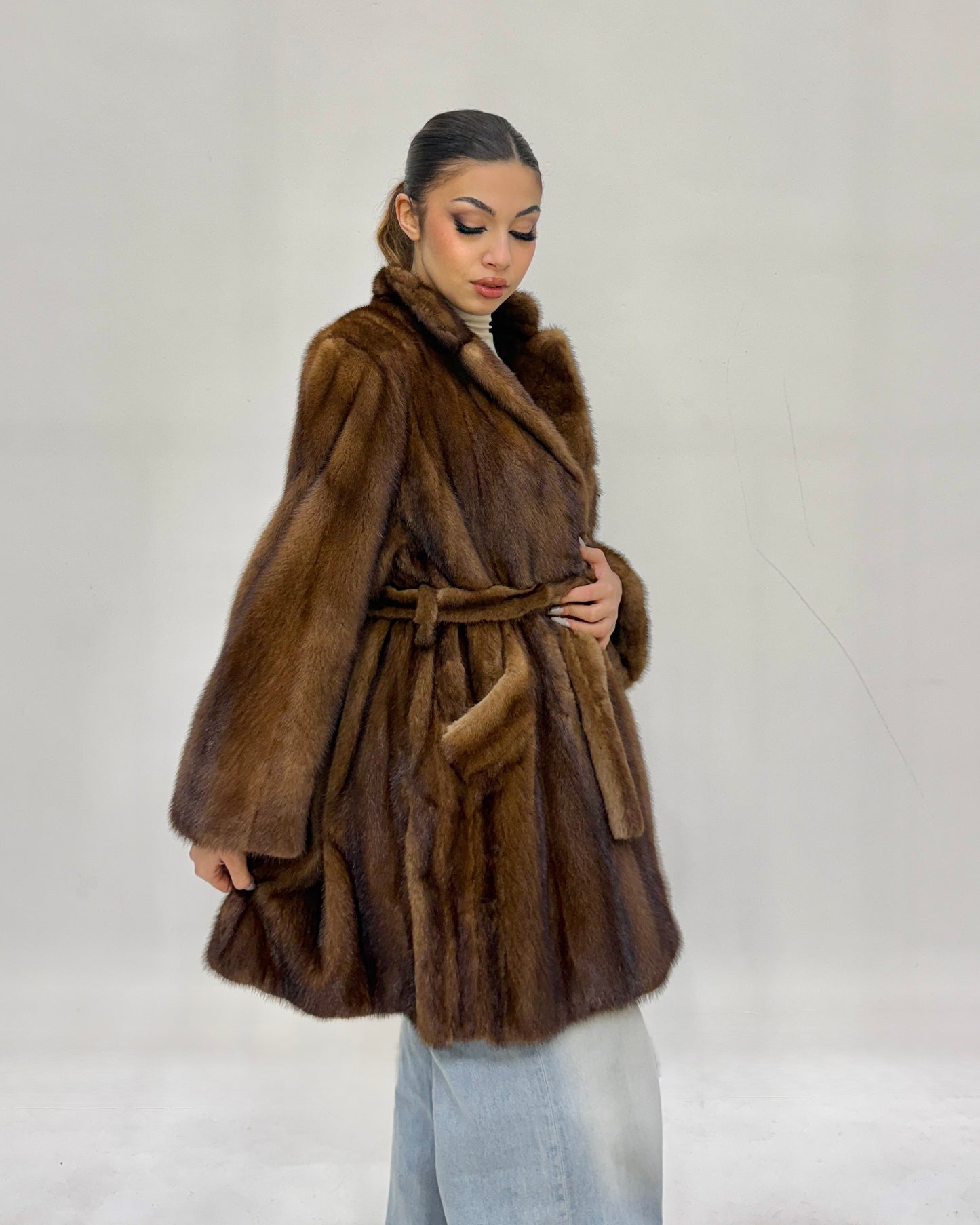 Visone con tasche e cintura